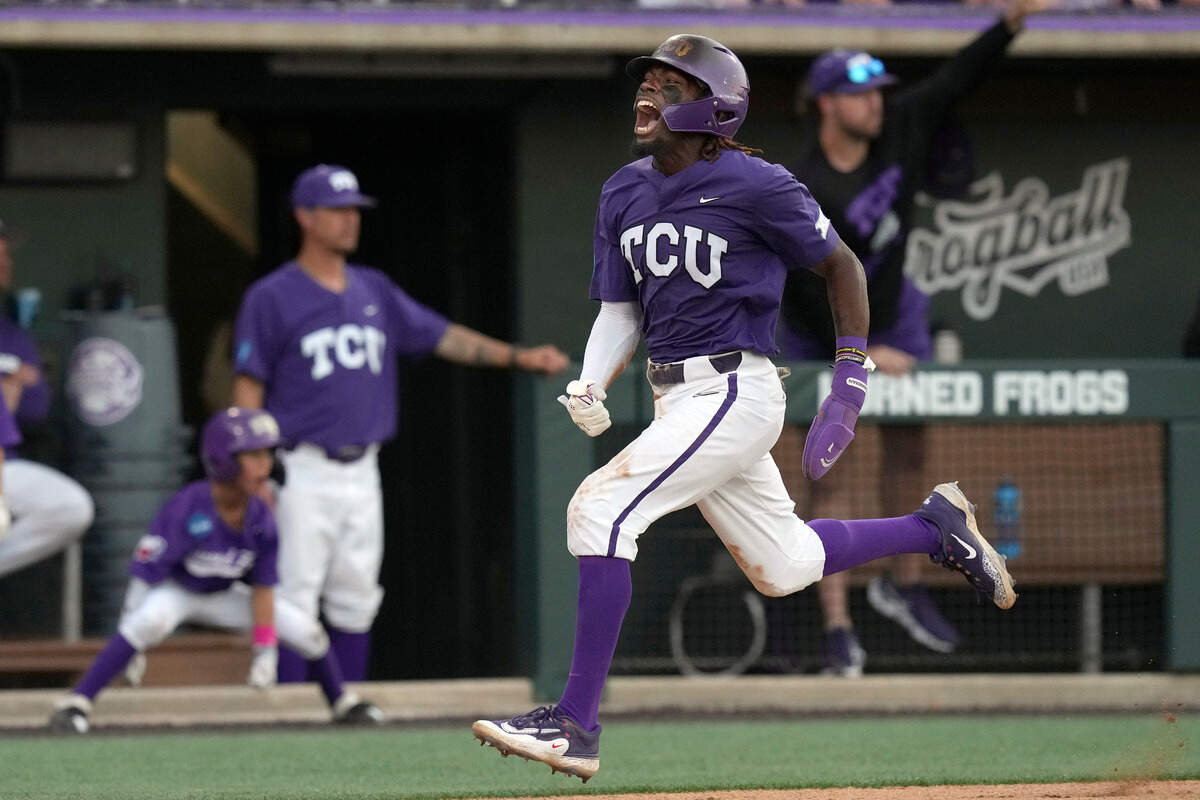 TCU’s Tre Richardson yells as he runs in to score on a single by teammate Anthony Silva during the fourth inning of an NCAA college baseball super regional game against Indiana State in Fort Worth, Texas, Saturday, June 10, 2023. (AP Photo/LM Otero)