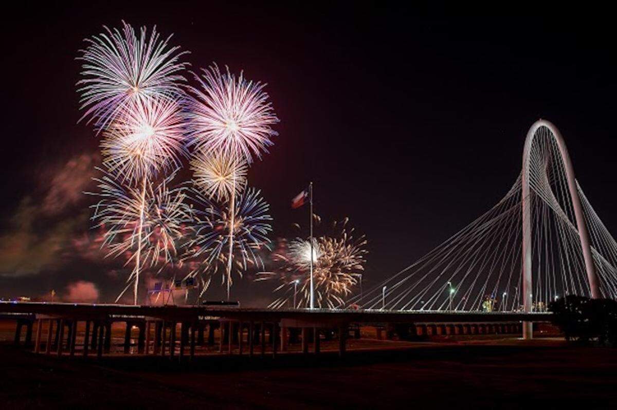 Fireworks light up the sky over the Margaret Hunt Hill Bridge in Dallas.