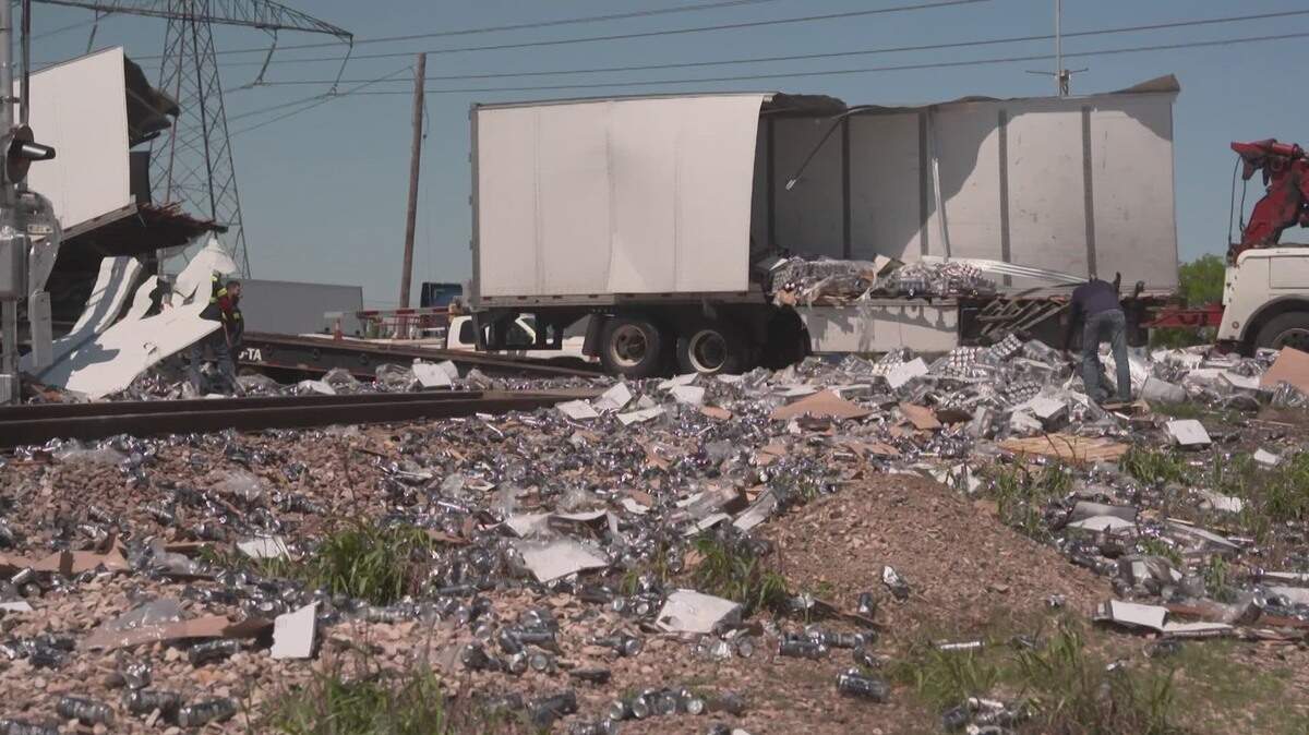 An 18-wheeler carrying cans of beer was destroyed in a train crash Monday morning, April 7, 2025.