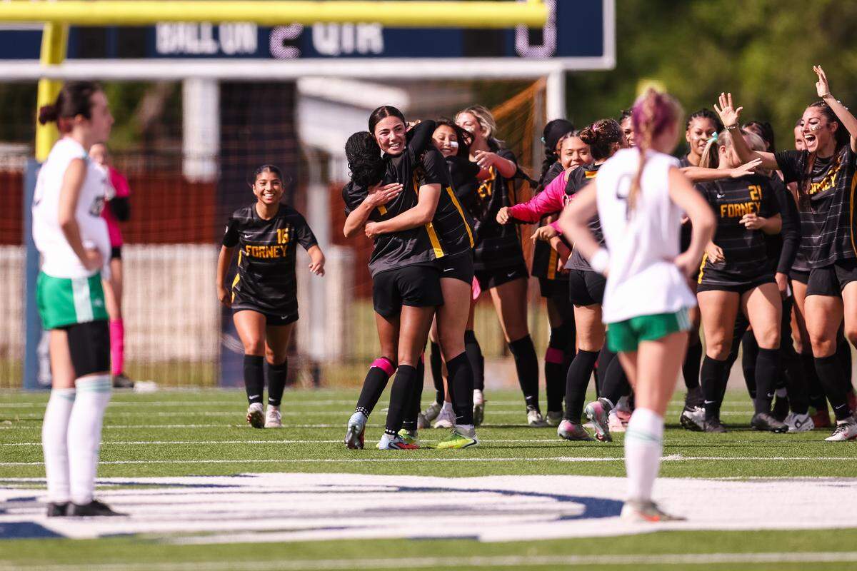Forney players celebrate after completing the upset over Southlake Carroll in a UIL Class 6A Division 2 girls soccer state semifinal on Saturday, April 4, 2026, at Memorial Stadium in Mesquite, Texas.