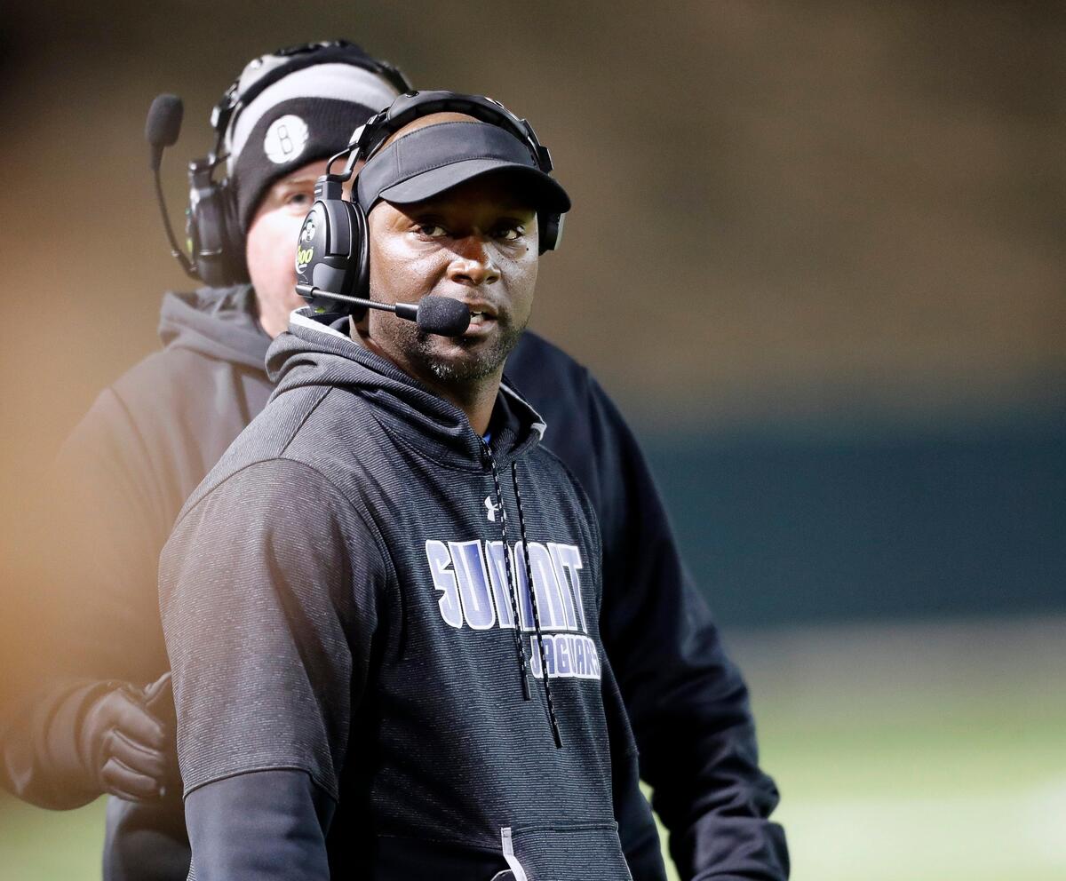 Summit head coach Channon Hall glances down the sidelines in the first half of a high school bi-district football playoff game at the Gopher-Warrior Bowl in Grand Prairie, Texas, Friday, Nov. 15, 2019. Lake Highlands led 35-19 at the half. (Special to the Star-Telegram Bob Booth)
