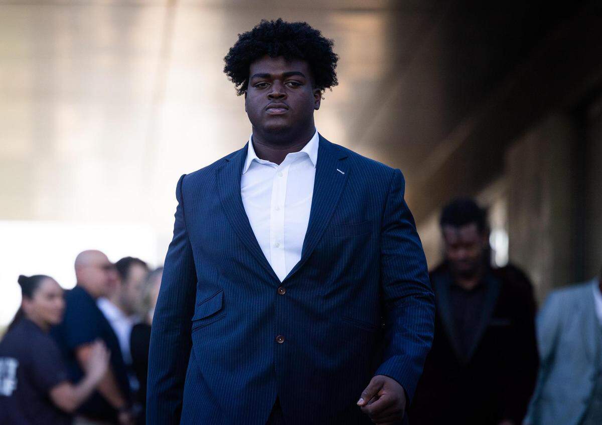 Dallas Cowboys Tyler Smith walks down the blue carpet for the season kickoff event Thursday, Aug. 25, 2022, at Ford Center in Frisco.