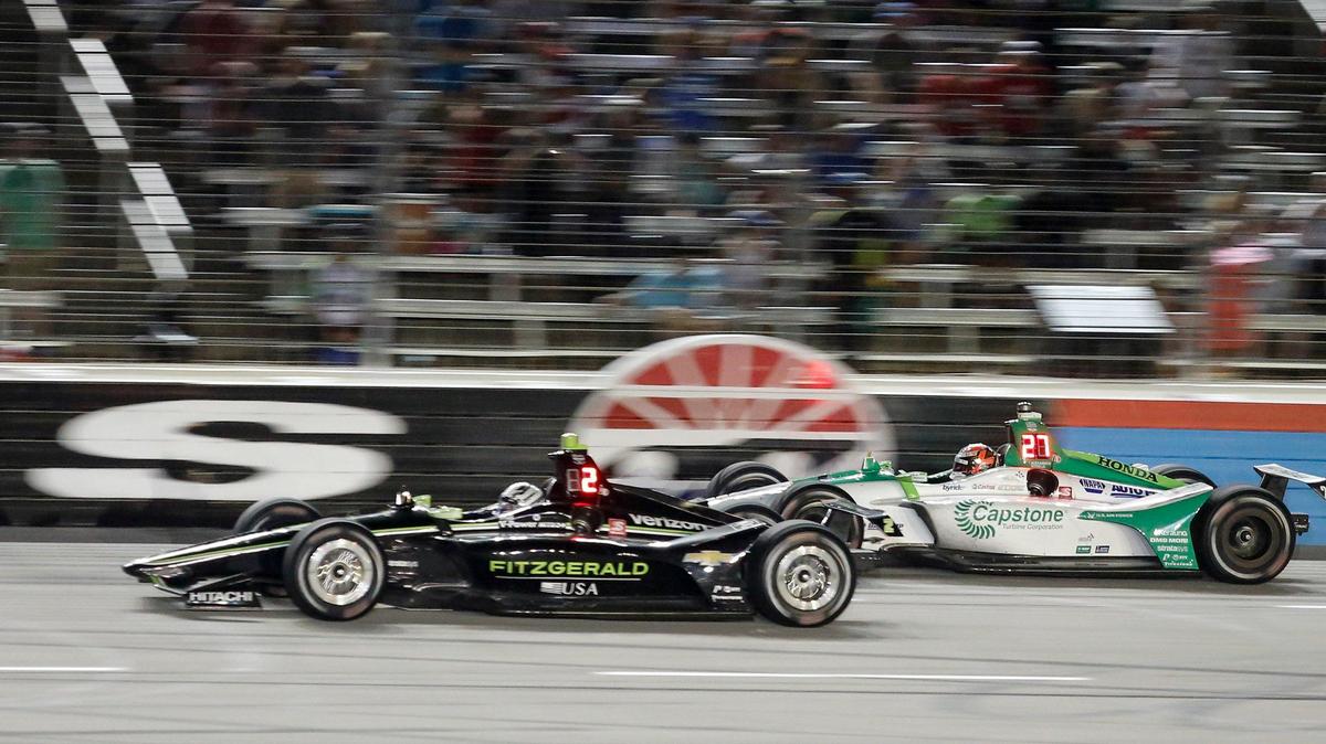 Josef Newgardewn (2) holds off Alexander Rossi (27) as he tries to pass late in the DXC Technology 600 IndyCar series race at Texas Motor Speedway in Fort Worth, TX on June 8, 2019