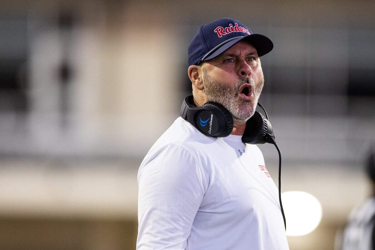 Denton Ryan Head Coach Dave Henigan is upset after referees in the first half of a high school football game between the Aledo Bearcats and the Denton Ryan Raiders at C.H. Collins Athletic Complex in Denton on Friday, Oct. 3, 2025.