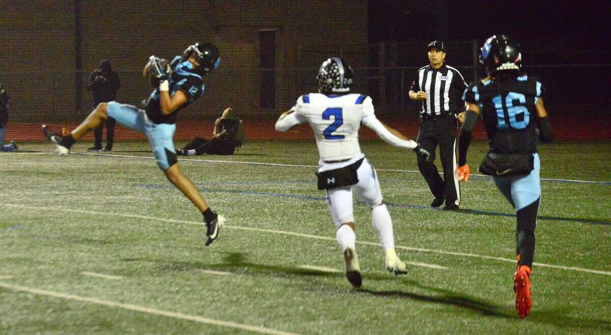 Arlington Seguin sophomore defensive back Jacob Bly (1), left, picks off a Mansfield Summit pass to kill a drive as Jaguar receiver Ian Gebhardt (2) and Cougar DB Caryell Brown (16) look on on Thursday, Nov. 7, 2024 at Wilemon Field in Arlington, Texas. Seguin went on to defeat Summit 36-28 to take the final playoff spot out of District 3-5A Division 2.