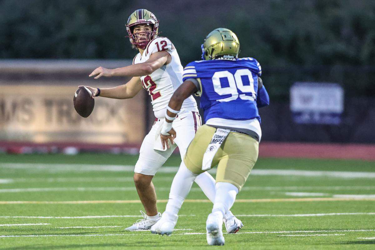 Saginaw quarterback Major Diego is pressured by Boswell’s Ashtyn Davis at Boswell Pioneer Stadium on Friday, Sept. 5, 2025.