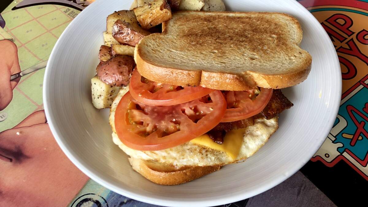 A bacon-egg-tomato-and-cheese sandwich at Fork in the Road in Arlington.