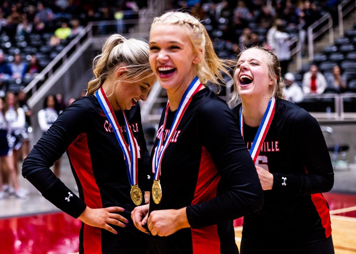 Morgan Howard (Left), Reagan Engler (Middle), and Ella Busey (Right) smile after achieving their state champion medals. Colleyville Heritage beat Frisco Reedy in the 5A state final at the Curtis Culwell Center in Garland on November 19th, 2022.