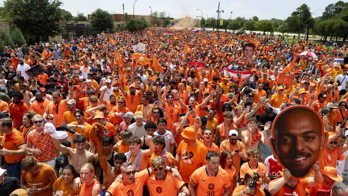 Netherlands soccer fans bring sea of orange to Dallas Stadium during FIFA World Cup