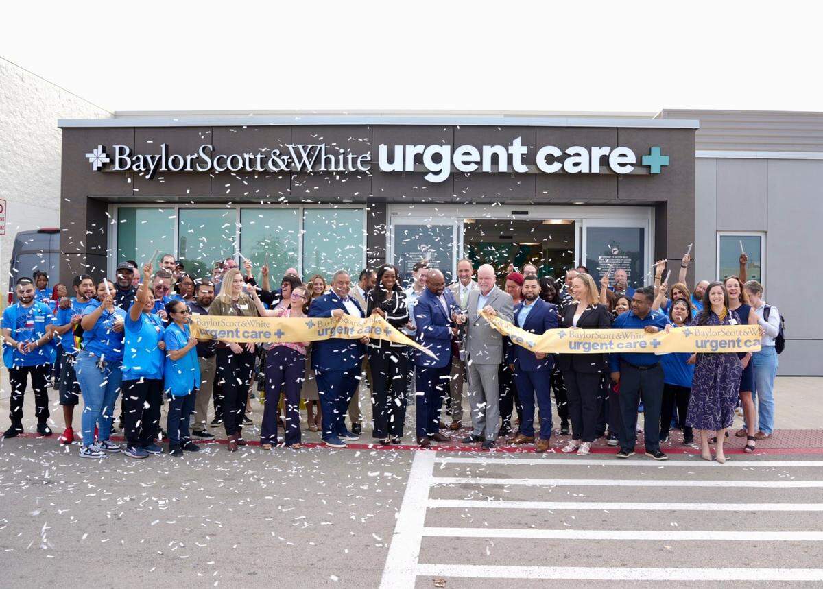 Attendees celebrate the opening of the new Baylor Scott & White Urgent Care+ clinic in south Fort Worth. 