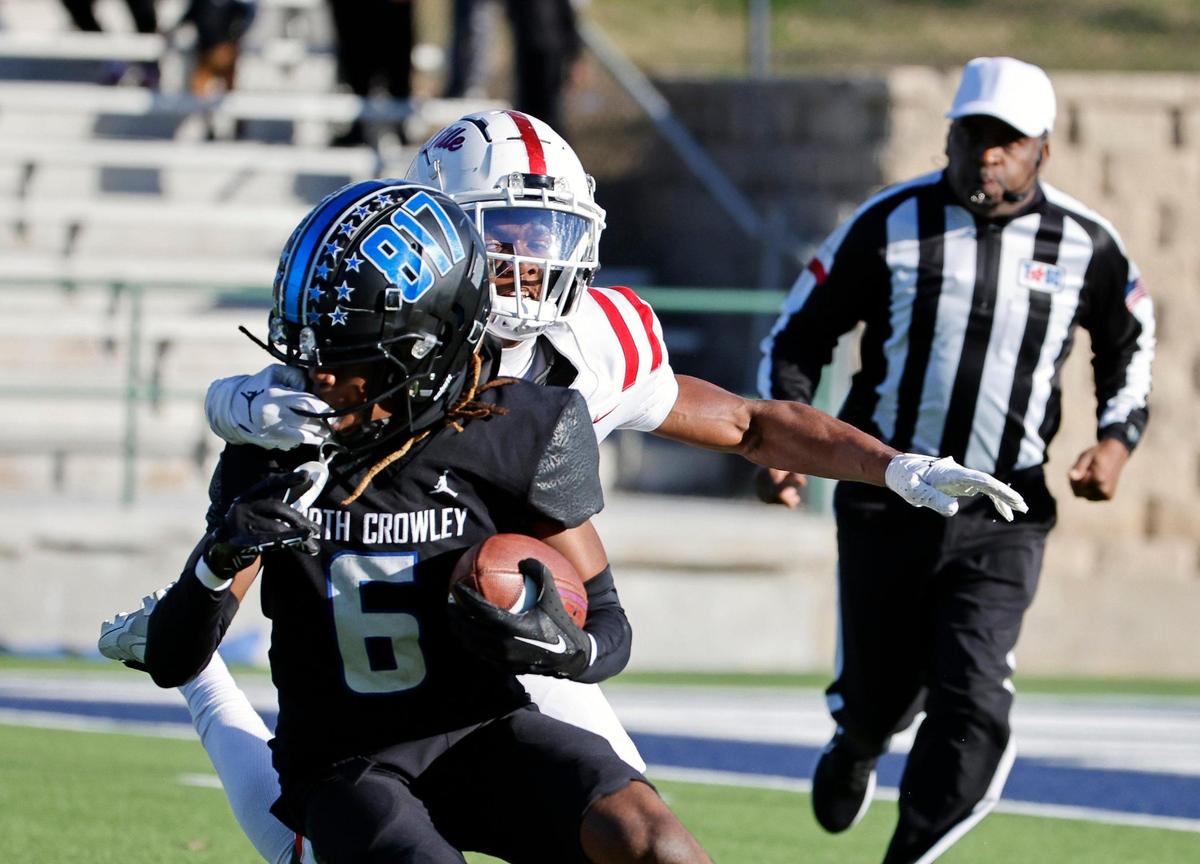 Duncanville was called for a face mask penalty on North Crowley wide receiver Lamarcus Davis (6) during the first half of a UIL Conference 6A Division I state semifinal football playoff game at Mesquite Memorial Stadium in Mesquite, Texas, Saturday, Dec. 09, 2023. Duncanville led North Crowley 24-0 at the half.