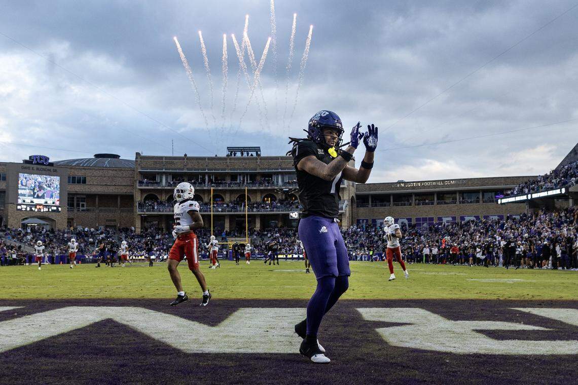 TCU wide receiver Jordan Dwyer (7) celebrates after scoring a touchdown in the first half of a Big XII conference game between the TCU Horned Frogs and the Cincinnati Bearcats at Amon G Carter Stadium in Fort Worth on Saturday, Nov. 29, 2025.