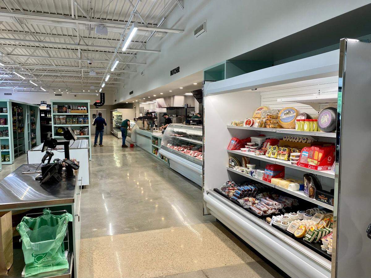 The former butcher shop and deli at Roy Pope Grocery is now a larger hot food serving line with entrees, sandwiches and grab-and-go items.