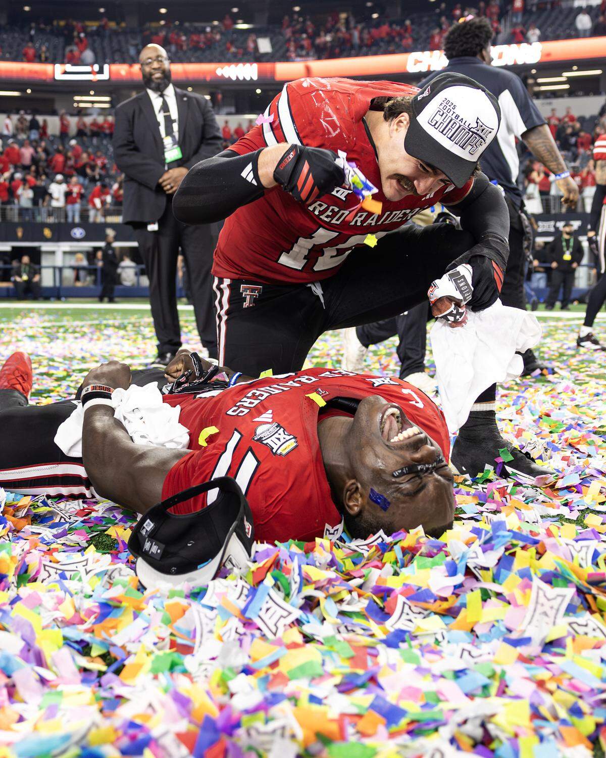 Texas Tech linebacker Jacob Rodriguez (10) tackles linebacker Bryce Ramirez (3) to celebrate after winning the Big XII championship game against the BYU Cougars at AT&T Stadium in Arlington on Saturday, Dec. 6, 2025.