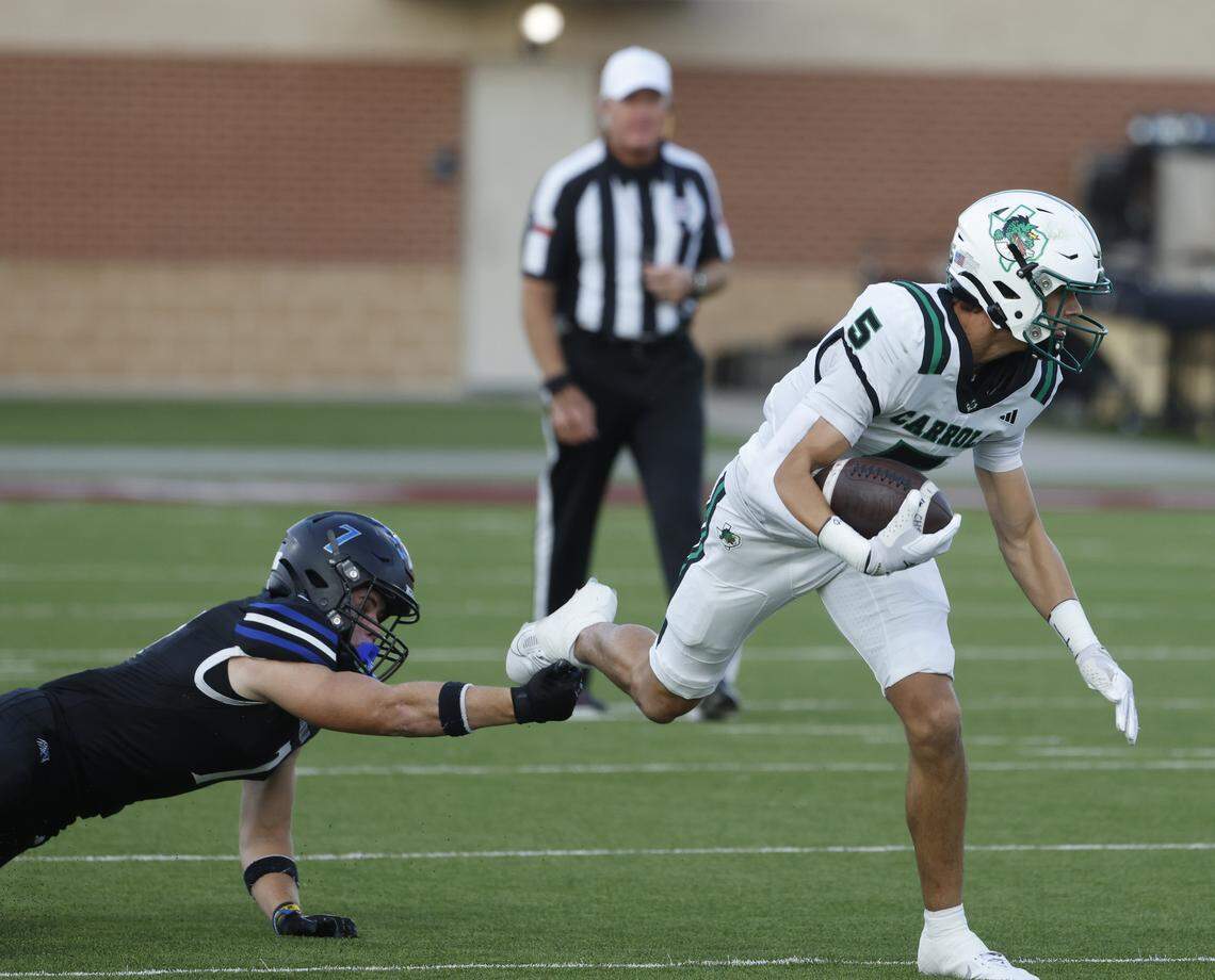 Byron Nelson Colt Pride (7) makes a shoestring tackle of Southlake wide receiver Blake Gunter (5) during the first half of a UIL football game between Southlake Carroll  and Byron Nelson at Northwest ISD Stadium in Justin, Texas, Friday, Sept. 12, 2025.