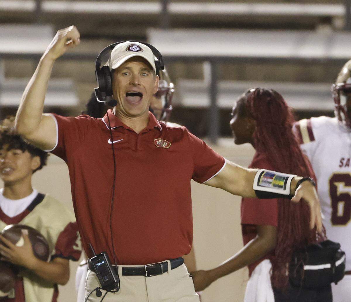 Saginaw head coach Mike Dewitt shouts in defensive plays during the first half of a UIL football game between Saginaw and Paschal at Farrington Field in Fort Worth, Texas, Thursday, October, 16, 2025.