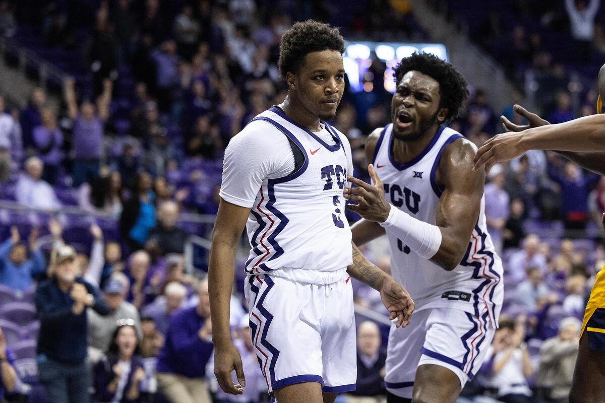 TCU guard Vasean Allette (3) ceebrates with center Ernest Udeh Jr. (8) after making the go ahead layup late in the second half of an NCAA game between TCU and West Virginia 65-60 at Schollmaier Arena in Fort Worth on Wednesday, Feb. 5, 2025.