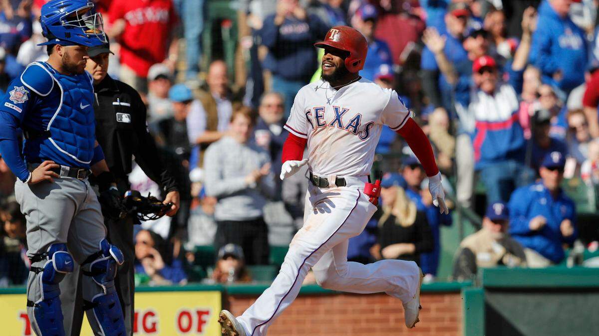 Delino DeShields was a happy camper in the fourth inning Sunday after connecting for the first grand slam of his career.