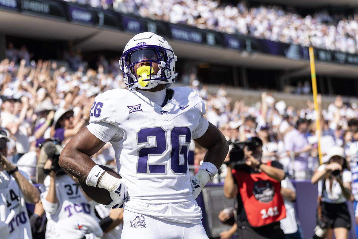 TCU running back Jeremy Payne (26) celebrates after rushing for a touchdown in the first half of an NCAA football game between TCU and SMU at Amon G. Carter Stadium in Fort Worth on Saturday, Sept. 20, 2025.