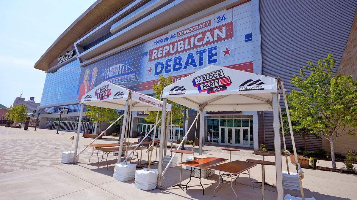 Canopies are set up for a block party by members of the Young America’s Foundation, led by former Wisconsin Gov. Scott Walker, before the August 23 Republican presidential debate, outside Fiserv Forum in Milwaukee on Monday.
