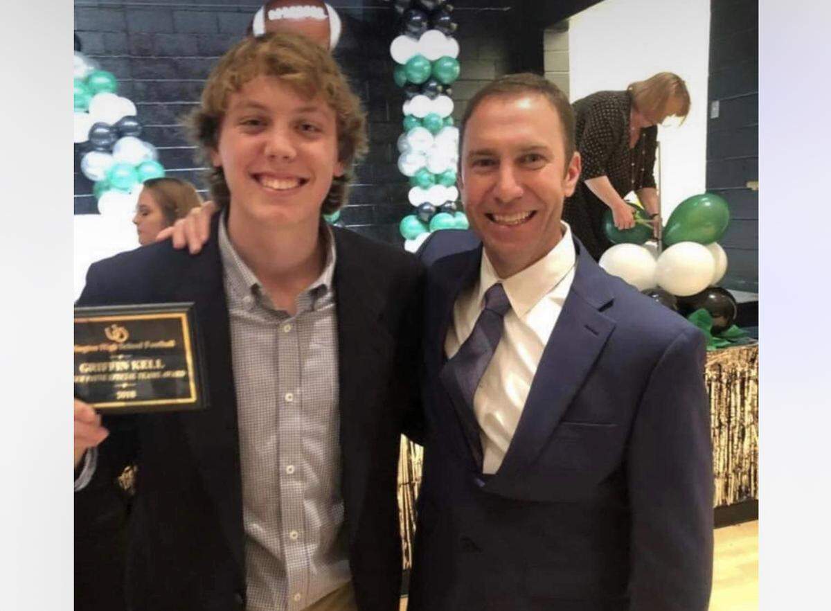 Griffin Kell was a 3-year starter at Arlington High School, with head coach Scott Peach (Meghan Kell/Courtesy)