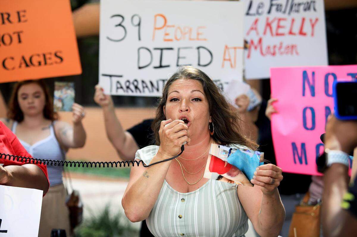 Kristina Salinas demands changes at the Tarrant County Jail during a rally on Tuesday, May 10, 2022, in Fort Worth. Salinas’ sister, Kelly Masten, is still in a coma following a 10 day stay in the jail in April.