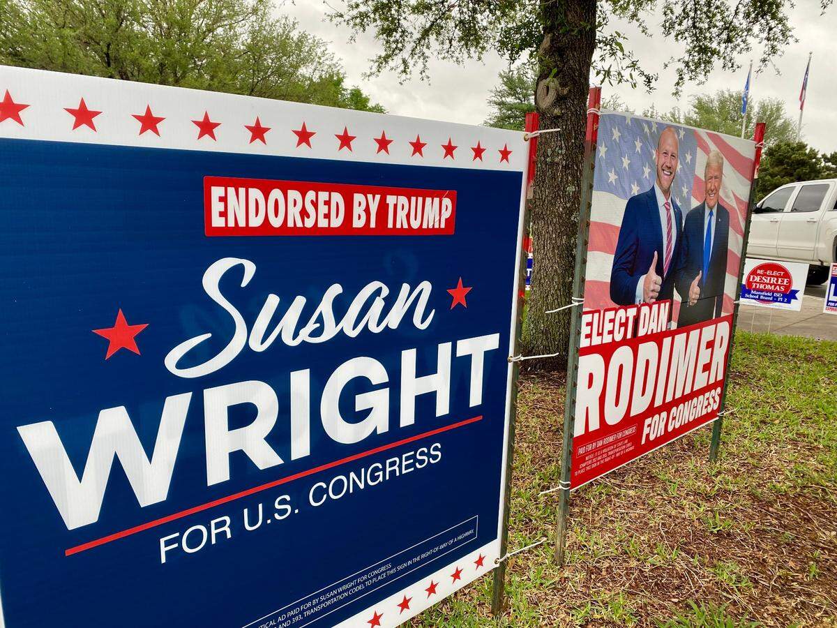 SIgns for District 6 candidates Susan Wright and Dan Rodimer both promote Donald Trump at the Mansfield subcourthouse.