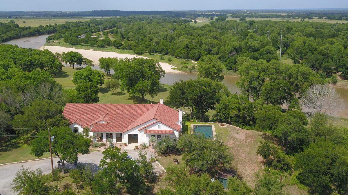Running Horse Ranch at 851 Red Bank Road is located on 57-plus acres of the Brazos River. 