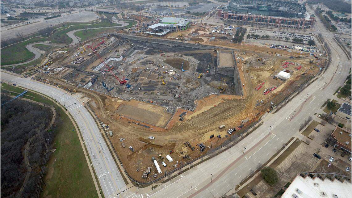 An aerial view of the construction site of Globe Life Field, the new home of the Texas Rangers that is scheduled to open in time for the 2020 season. In the background is Globe Life Park, the current home of the Texas Rangers. Between the current ballpark and the new stadium, construction is underway for Texas Live!, the $250 million entertainment complex, which is scheduled to open in August.