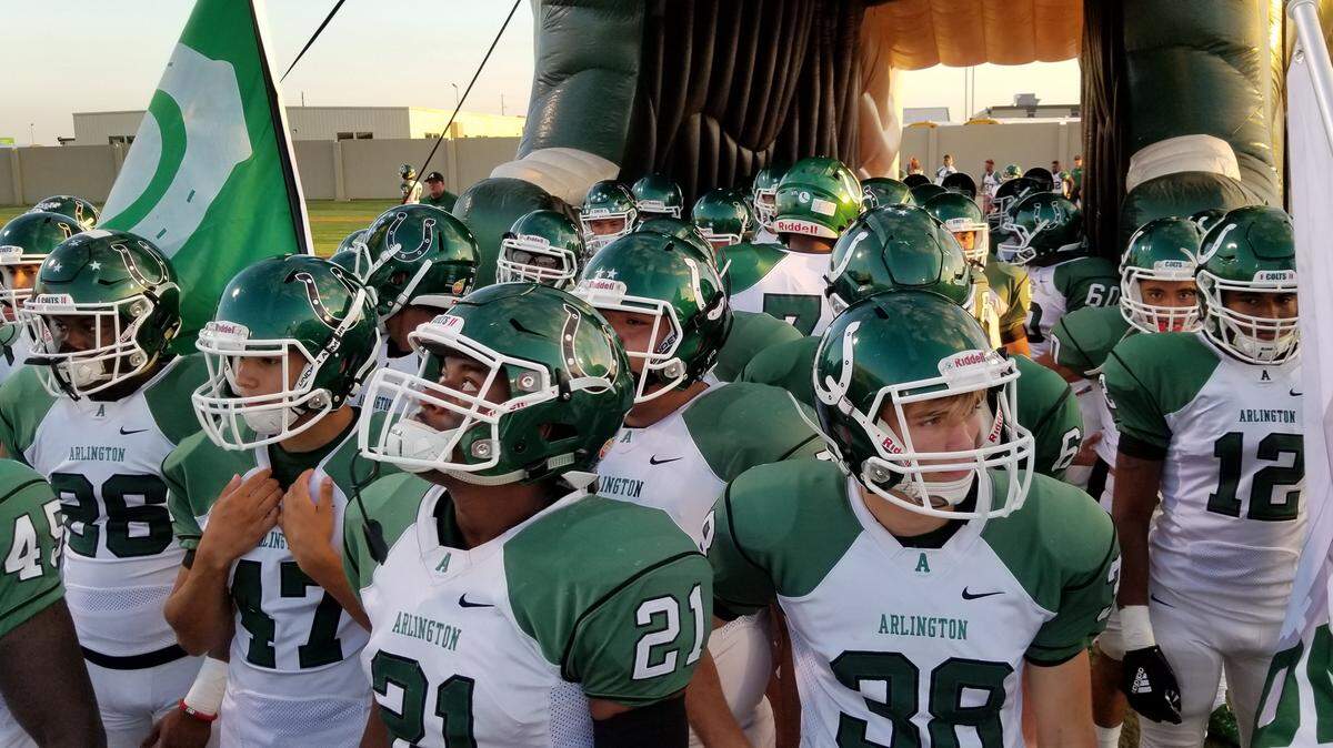 Arlington High players gear up for Thursday’s game against Fort Worth Paschal at Clark Stadium.