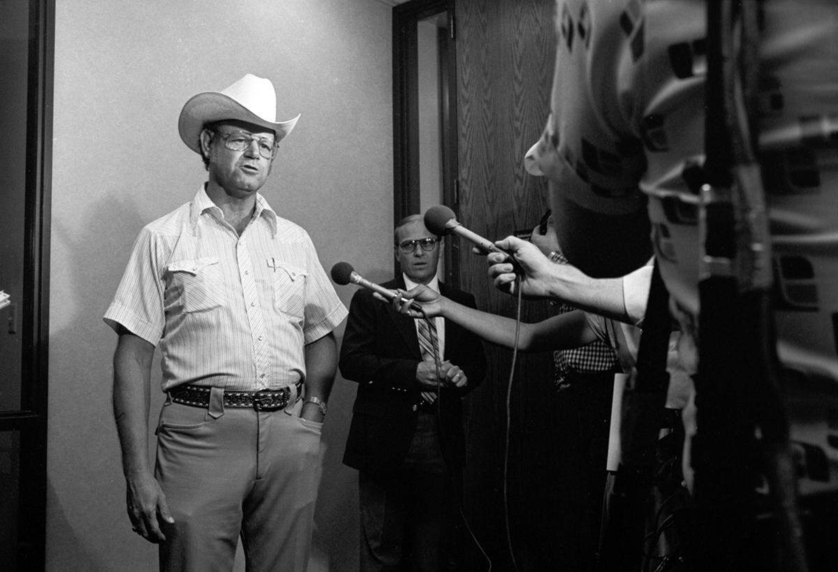 Local citizens and members of the press gathered around Collin County Sheriff Jerry Burton prior to the arrival of suspect Candace Montgomery. Montgomery surrendered to deputies after being accused of killing Betty Gore.