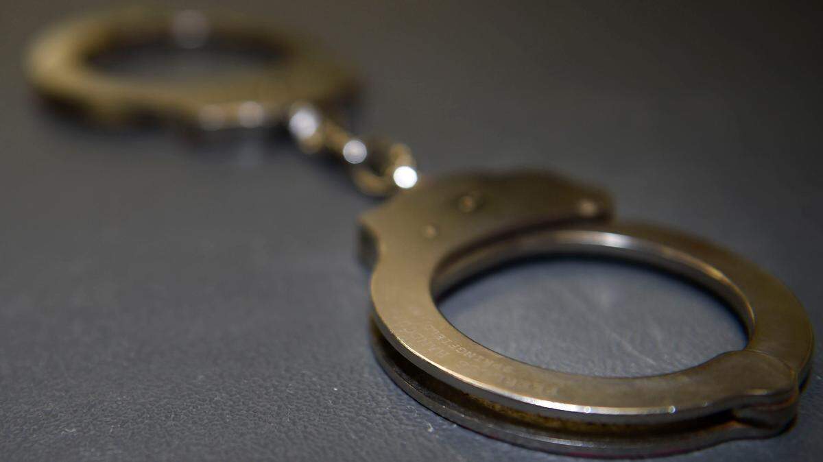 A set of handcuffs is pictured.