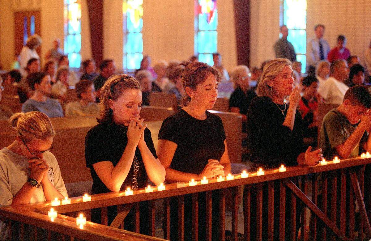 Members of the First United Methodist Church in Grapevine assembled to pray and had a candle vigil for the victims of the terrorist attacks.