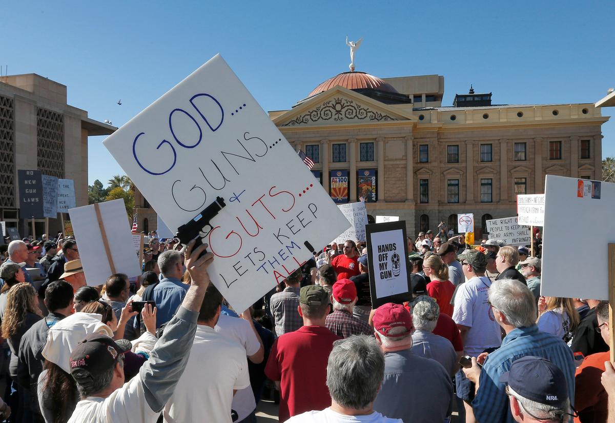 Gun rights supporters outside the Arizona Capitol in 2013. (AP Photo/Matt York, File)