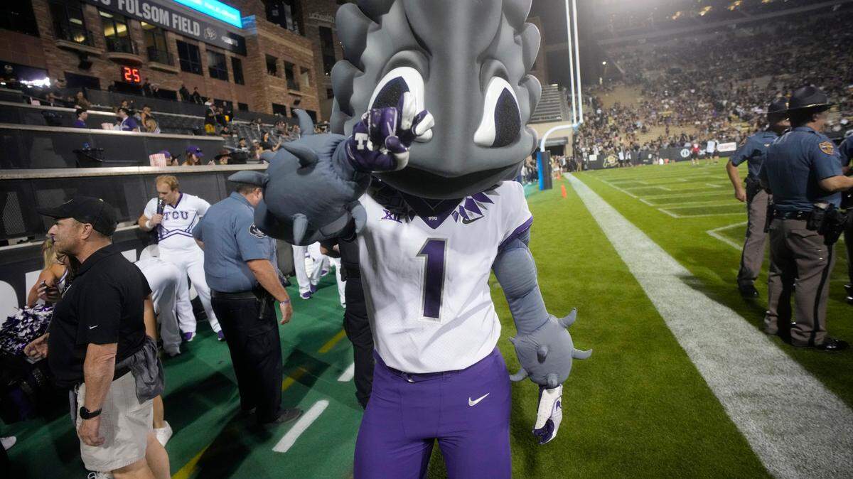 TCU mascot SuperFrog will be an honorary drone pilot in the light show Friday. FILE -- Sept. 2, 2022, in Boulder, Colo. (AP Photo/David Zalubowski)