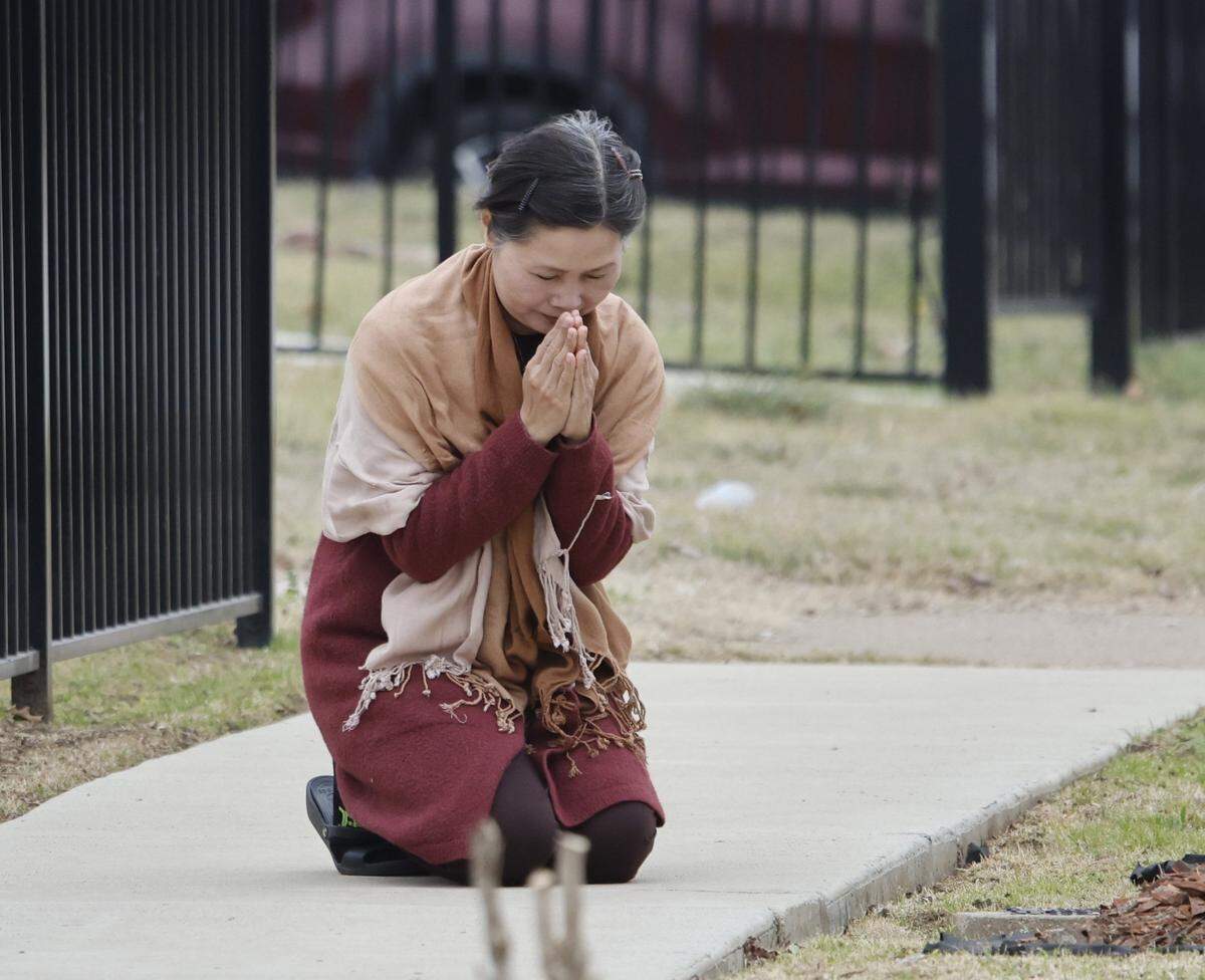 Several people along the walk route prayed for the Buddhist monks who walked nearly 2,300 miles to Washington, D.C., for peace as they arrived back at the Húóng Dao Vipassana Bhavana Center in Fort Worth, Texas, on Saturday, Feb. 14, 2026.