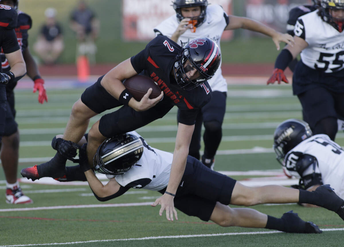 Colleyville’s Bodey Weaver is brought down against The Colony during their game at Mustang -Panther Stadium on Friday, Sep. 12, 2025.