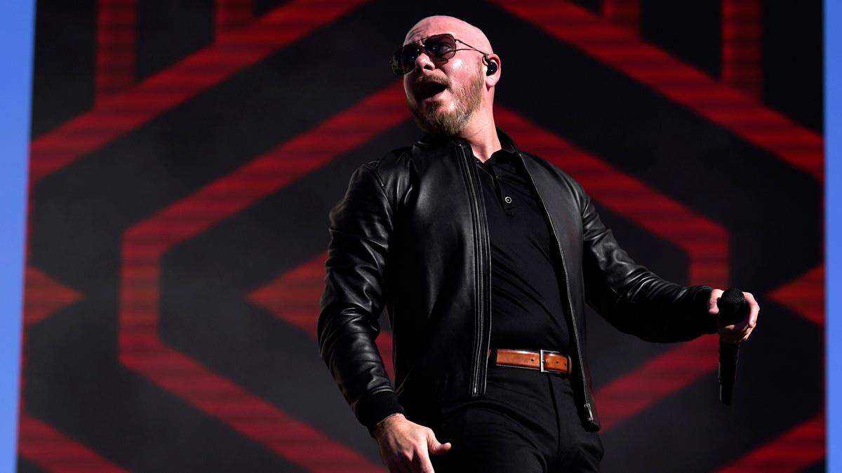 Artist Pitbull performs before a NASCAR exhibition auto race at Los Angeles Memorial Coliseum on Feb. 6, 2022, in Los Angeles.