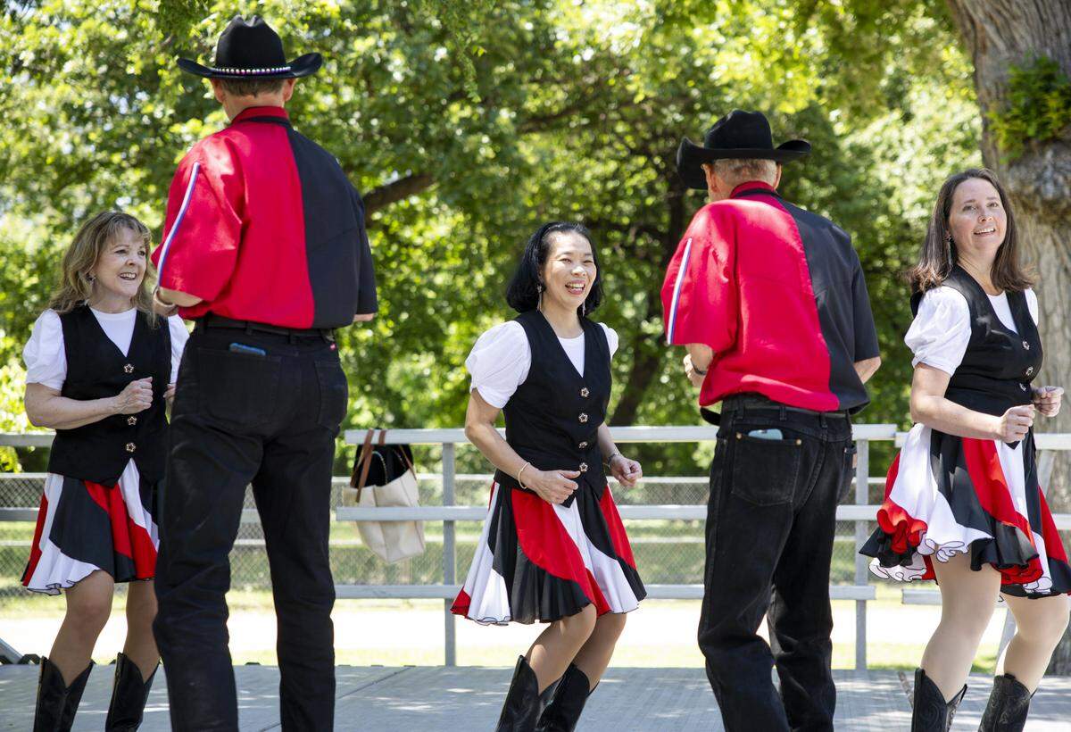 The Texas Boot Scooters perform during Mayfest at Trinity Park on Saturday, May 2, 2026, in Fort Worth, Texas. Mayfest featured a variety of performances from local groups, ranging from martial arts performances to hip-hop dancing.