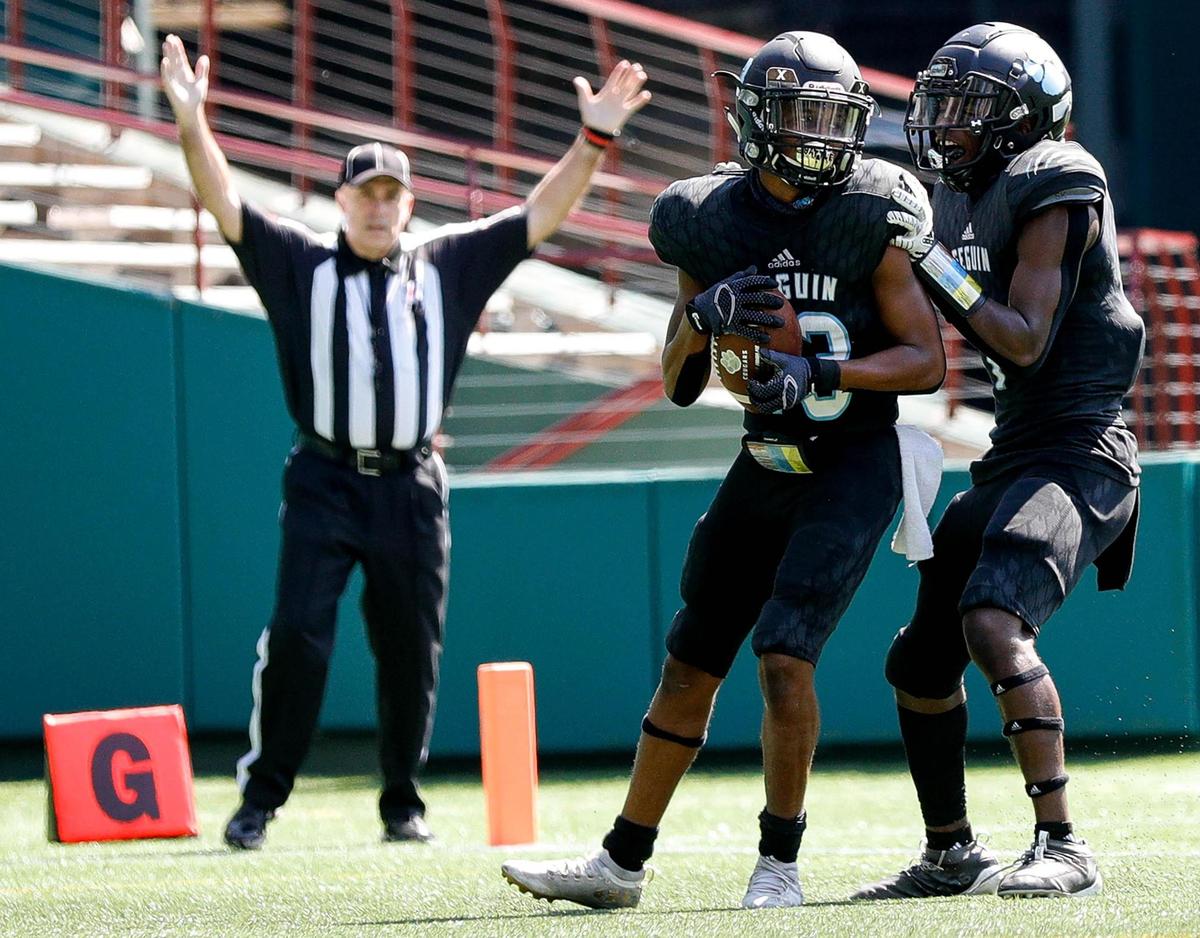 Arlington Seguin receiver Wisdom Gibson (13) scores a touchdown against O.D. Wyatt during the first half, Saturday afternoon, Sepember 26, 2020 played at Globe Life Park in Arlington, TX (Steve Nurenberg Special to the Star-Telegram)