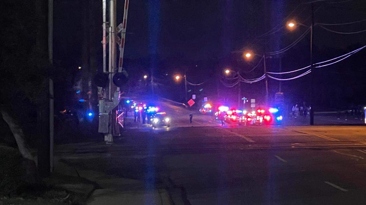 Police are investigating reports of shots fired Monday night, March 13, 2023, at Katherine Rose Memorial Park in Mansfield, where a large crowd had gathered.