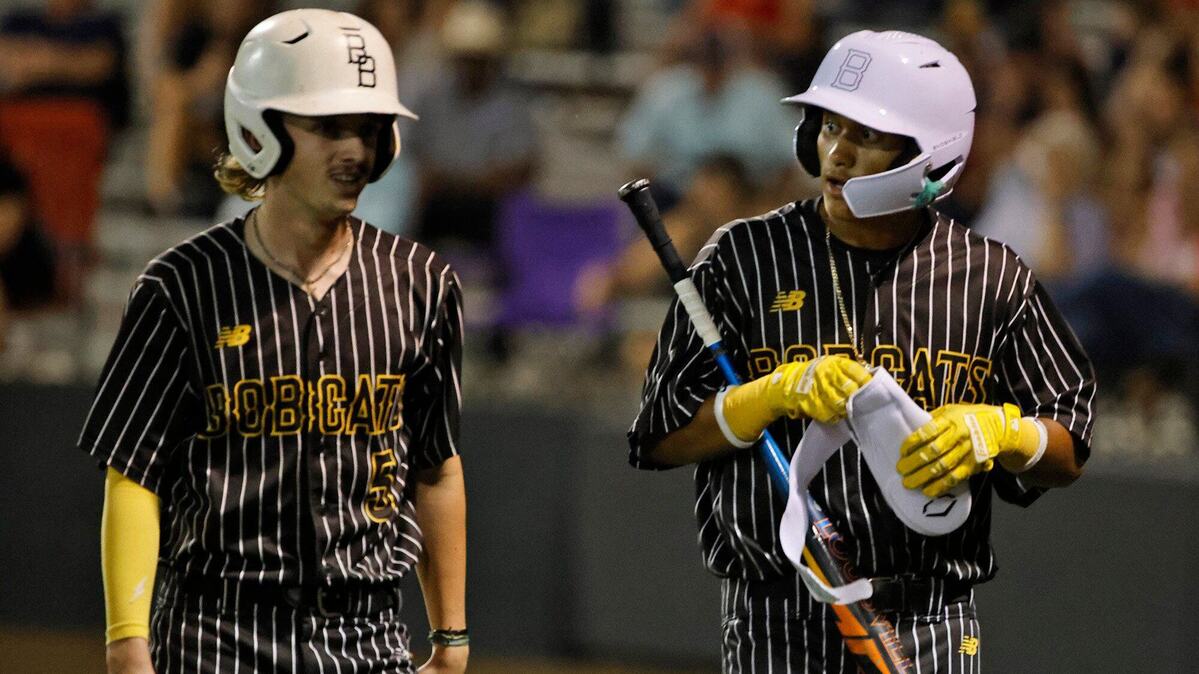 Benbrook’s Vance Morton and Ethan Smith head to their dugout after both players scored during a UIL District 4A Region 2 Quarterfinals at Coppell Baseball Complex in Coppell, Texas, Friday, May 17, 2024.
