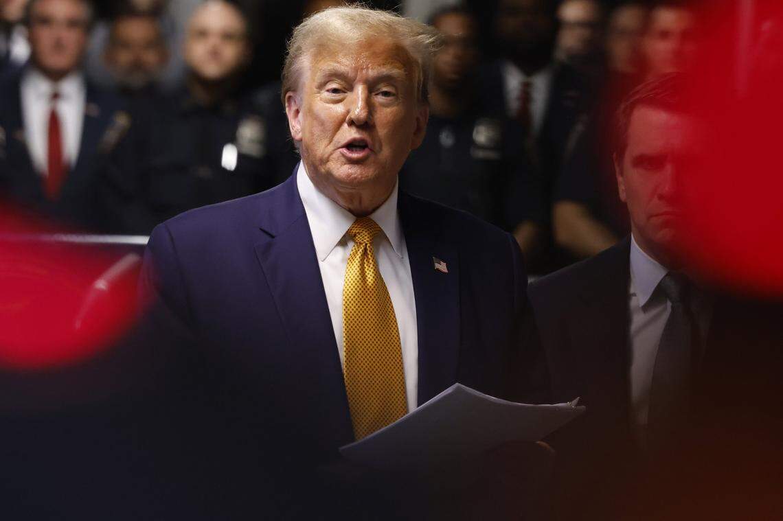May 14, 2024; New York, NY, USA; Former U.S. President Donald Trump gives end of the day remarks after exiting the courtroom during his hush money trial at Manhattan Criminal Court on May 14, 2024 in New York City. Prosecutors wrapped up direct questioning of Michael Cohen, former U.S. President Donald Trump's former attorney, and faces cross examination by the defense when court resumes in the former president's hush money trial. Cohen's $130,000 payment to Stormy Daniels is tied to Trump's 34 felony counts of falsifying business records in the first of his criminal cases to go to trial. Mandatory Credit: Michael M. Santiago/Pool via USA TODAY NETWORK