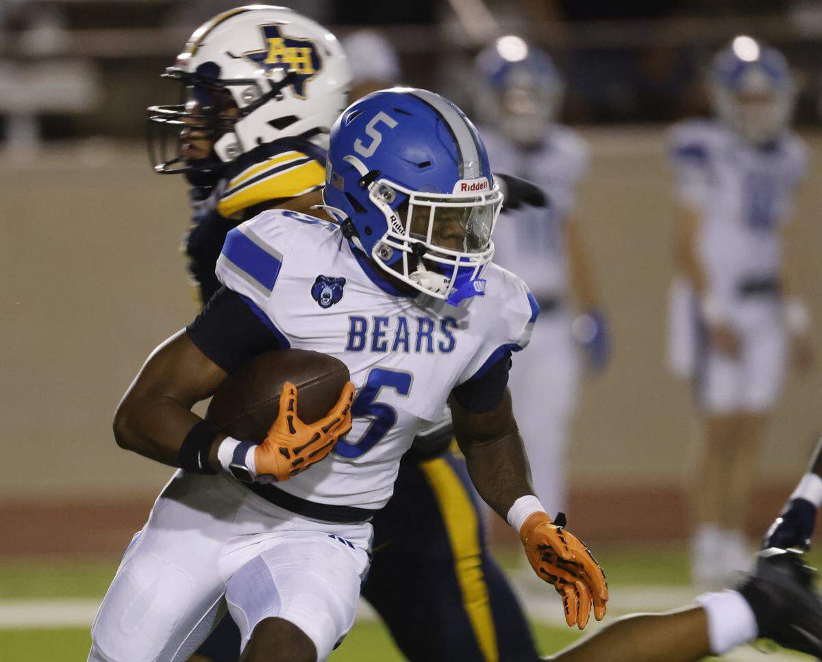 Brewer free safety Kaiden Foster (5) returns a punt during the first half of a UIL Conference 5A D1 Bi-District playoff game between Arlington Heights and Brewer at Farrington Field in Fort Worth, Texas, Friday, Nov. 14, 2025.