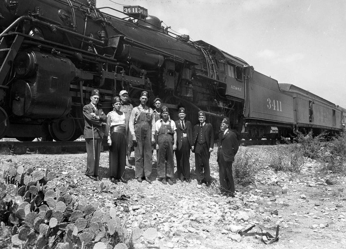 1946: A group of 69 Fort Worth Shriners are traveling on a Santa Fe tour of West Texas. From left, front: I.S. McConnell, E.L. Craft, W.E. Kinsey, Charles E. Hicks, S.R. Lockett, Jack Stanford, J.H. Marble. Back: J.L. Feagan and J.M. Lasseter.
