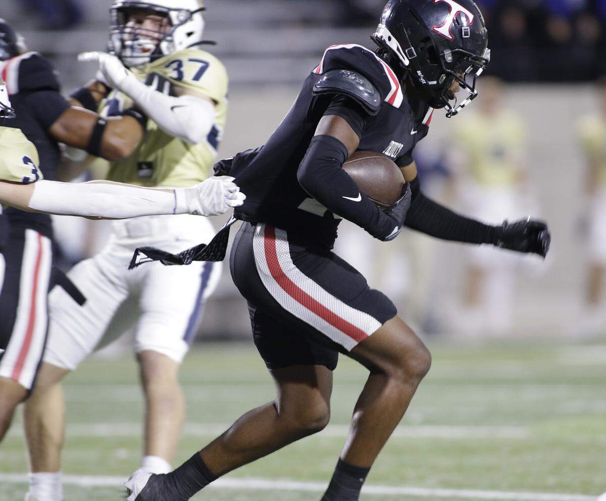 Euless Trinity’s Chayce Davis returns a kickoff against Keller during their game on Friday, October 17, 2025 at Pennington Field in Bedford, Texas.
