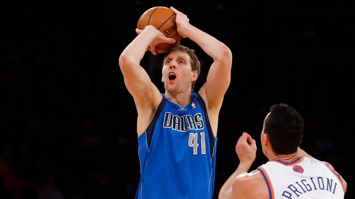 Dallas Mavericks’ Dirk Nowitzki (41), of Germany, shoots against New York Knicks’ Pablo Prigioni (9), of Argentina, during the second half of an NBA basketball game Monday, Feb. 24, 2014, in New York. Dallas won 110-108. (AP Photo/Jason DeCrow)