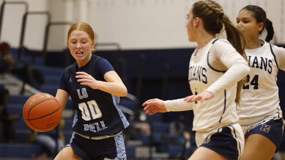 L.D. Bell guard Hannah Due (00) drives to the paint during the first half of a UIL girls basketball game between L.D. Bell and Keller at Keller High School in Keller, Texas, Friday Jan. 16, 2026