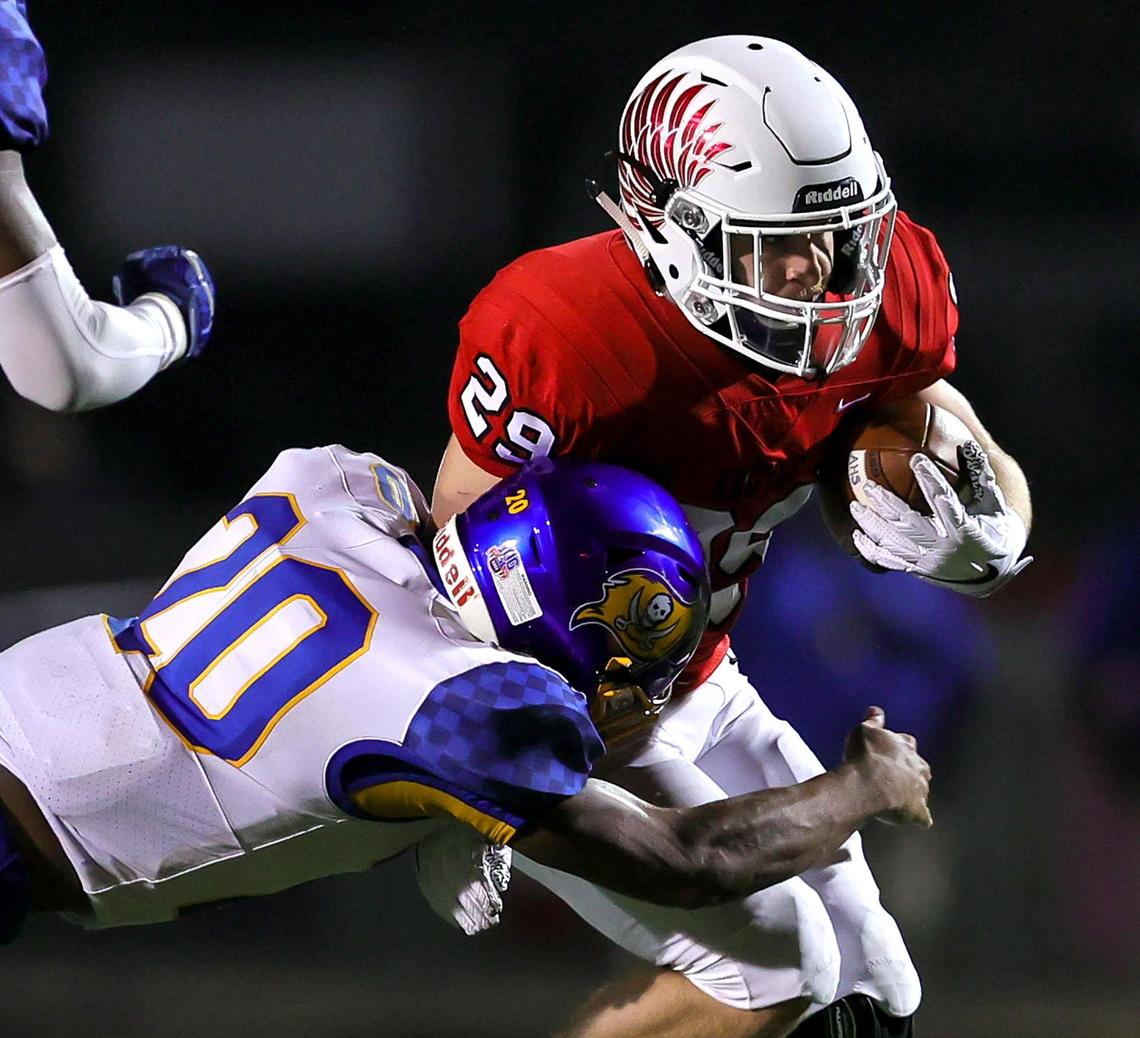 Argyle running back Braden Baker (29) tries to break free from Waco La Vega linebacker Jordan Rogers (20) during the second half, Friday night, September 18, 2020 played at Argyle High School in Argyle, Tx. (Steve Nurenberg Special to the Star-Telegram)