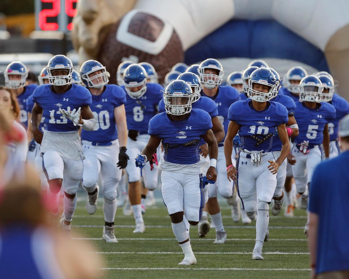 The Kangaroos take the field before the game. The Haltom Buffalos played the Weatherford Kangaroos at Kangaroo Stadium in Weatherford Thursday, Oct. 3, 2019.